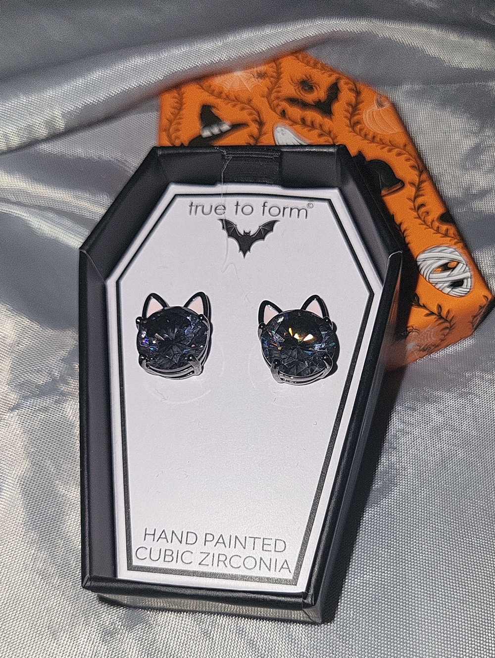 Cat gem stud earrings BNIB gunmetal
